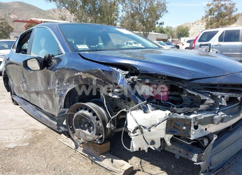 Photo 6 of 2022 Toyota Camry LE HYBRID (VIN 4T1C31AK2NU572063)