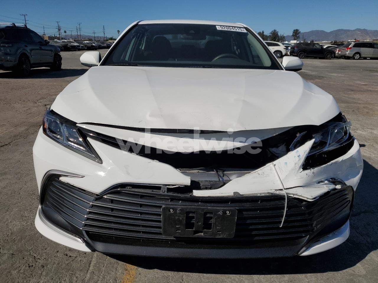 Photo 5 of 2022 TOYOTA CAMRY LE (VIN 4T1C31AK2NU575058)