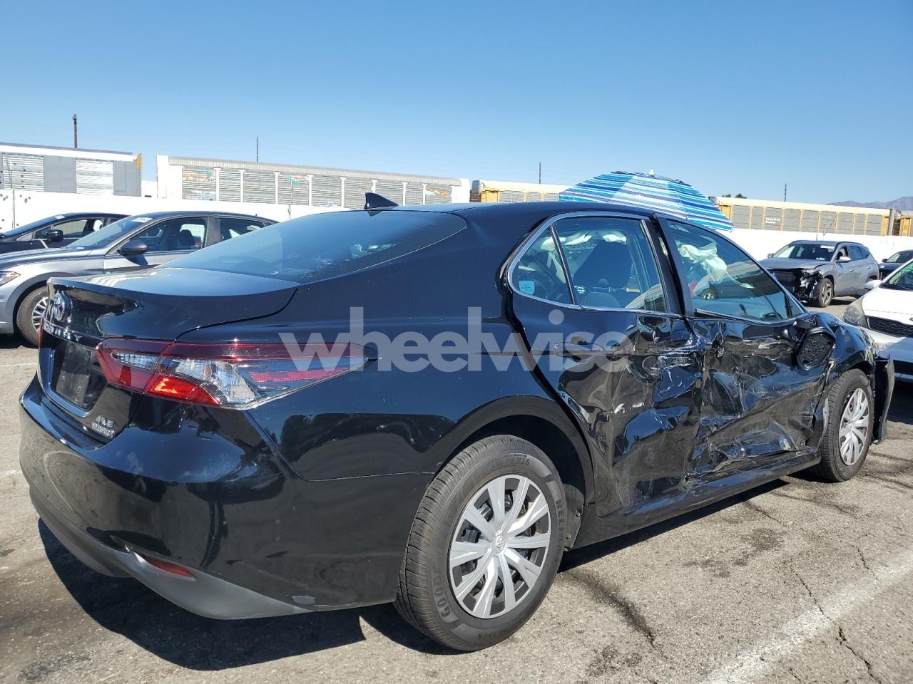Photo 3 of 2021 TOYOTA CAMRY LE (VIN 4T1C31AK5MU553795)