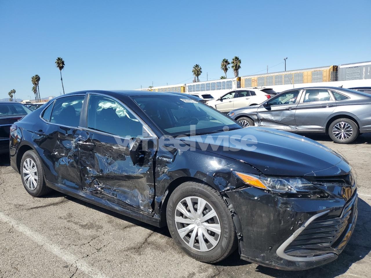 Photo 4 of 2021 TOYOTA CAMRY LE (VIN 4T1C31AK5MU553795)