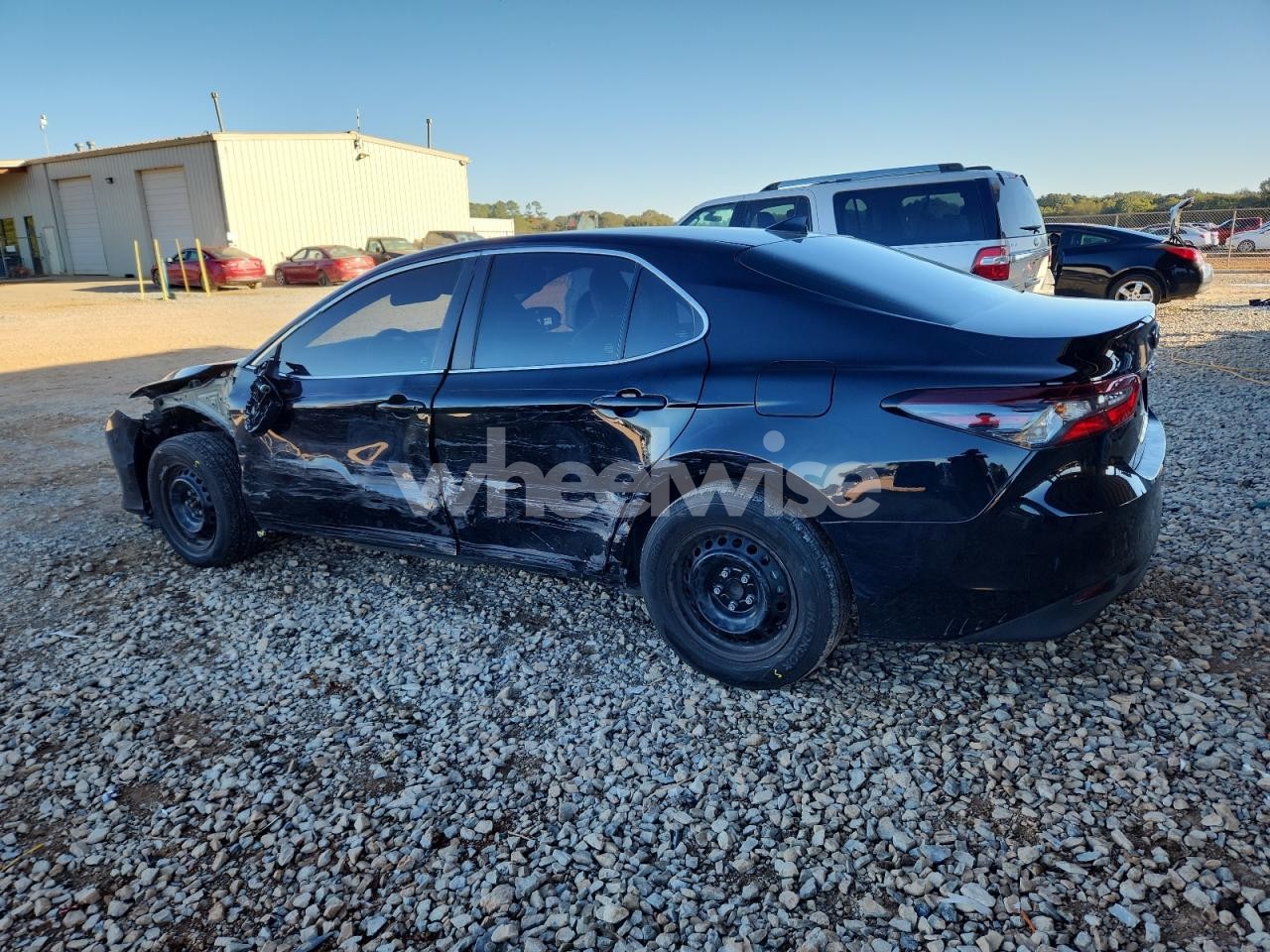 Photo 2 of 2023 TOYOTA CAMRY LE (VIN 4T1C31AK6PU603124)
