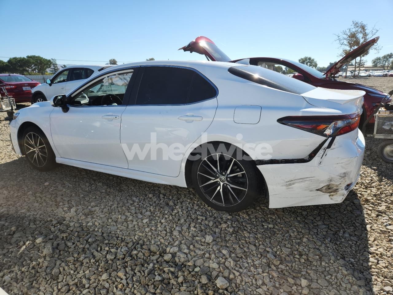 Photo 2 of 2021 TOYOTA CAMRY SE (VIN 4T1G11AK2MU594067)