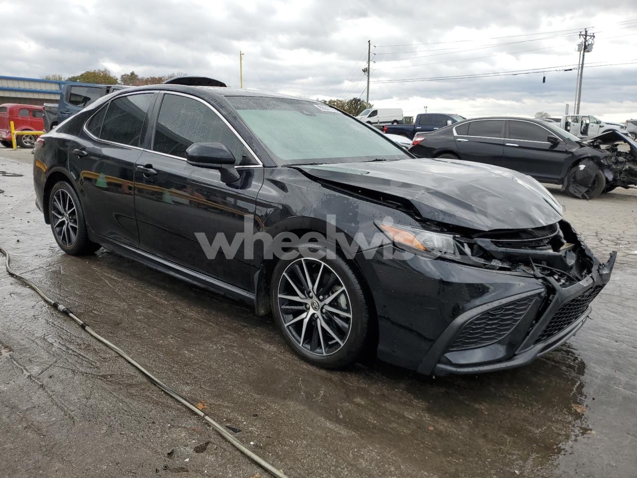 Photo 4 of 2021 TOYOTA CAMRY SE (VIN 4T1G11AK2MU614141)
