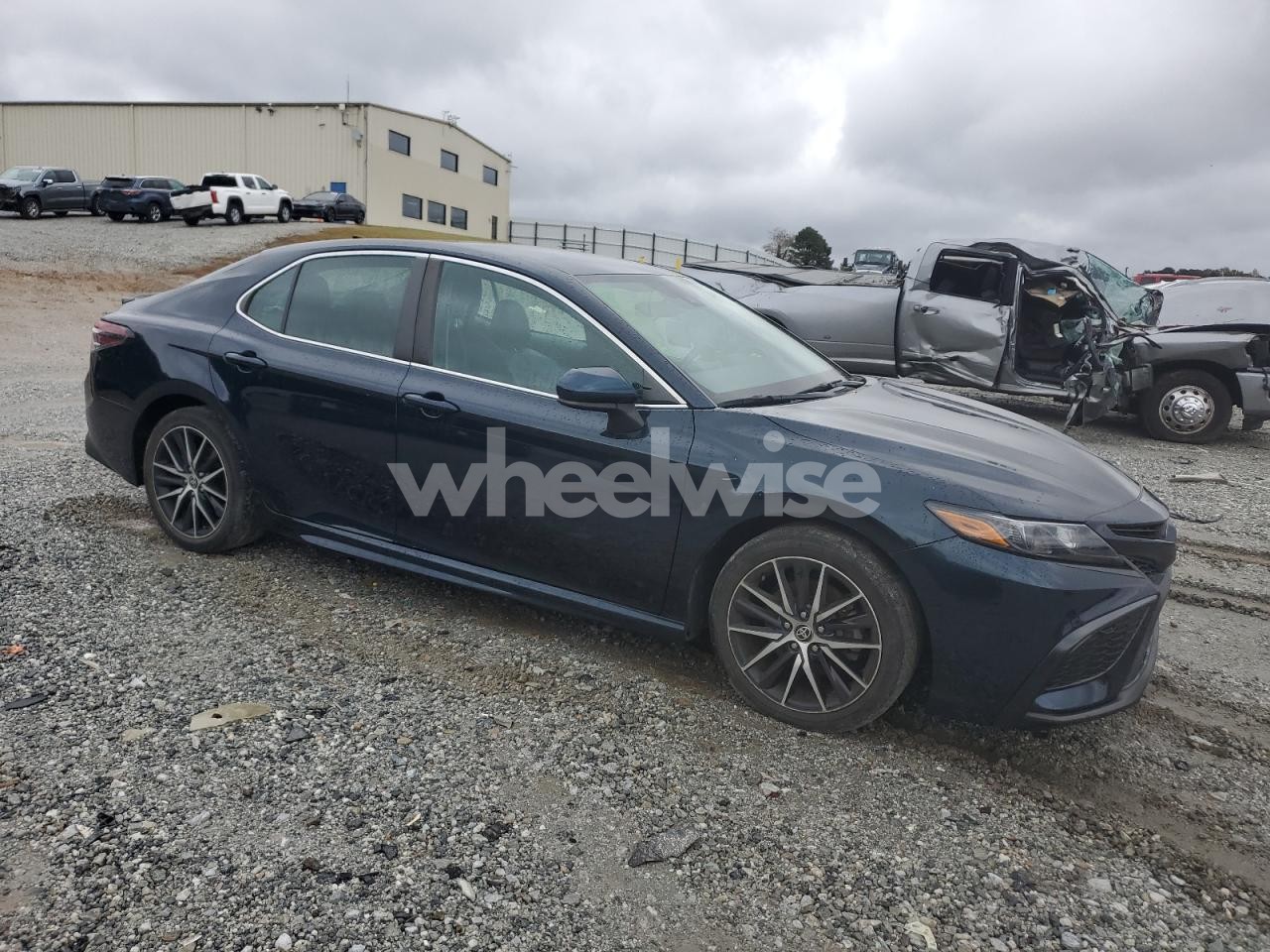 Photo 4 of 2021 TOYOTA CAMRY SE (VIN 4T1G11AK5MU455695)