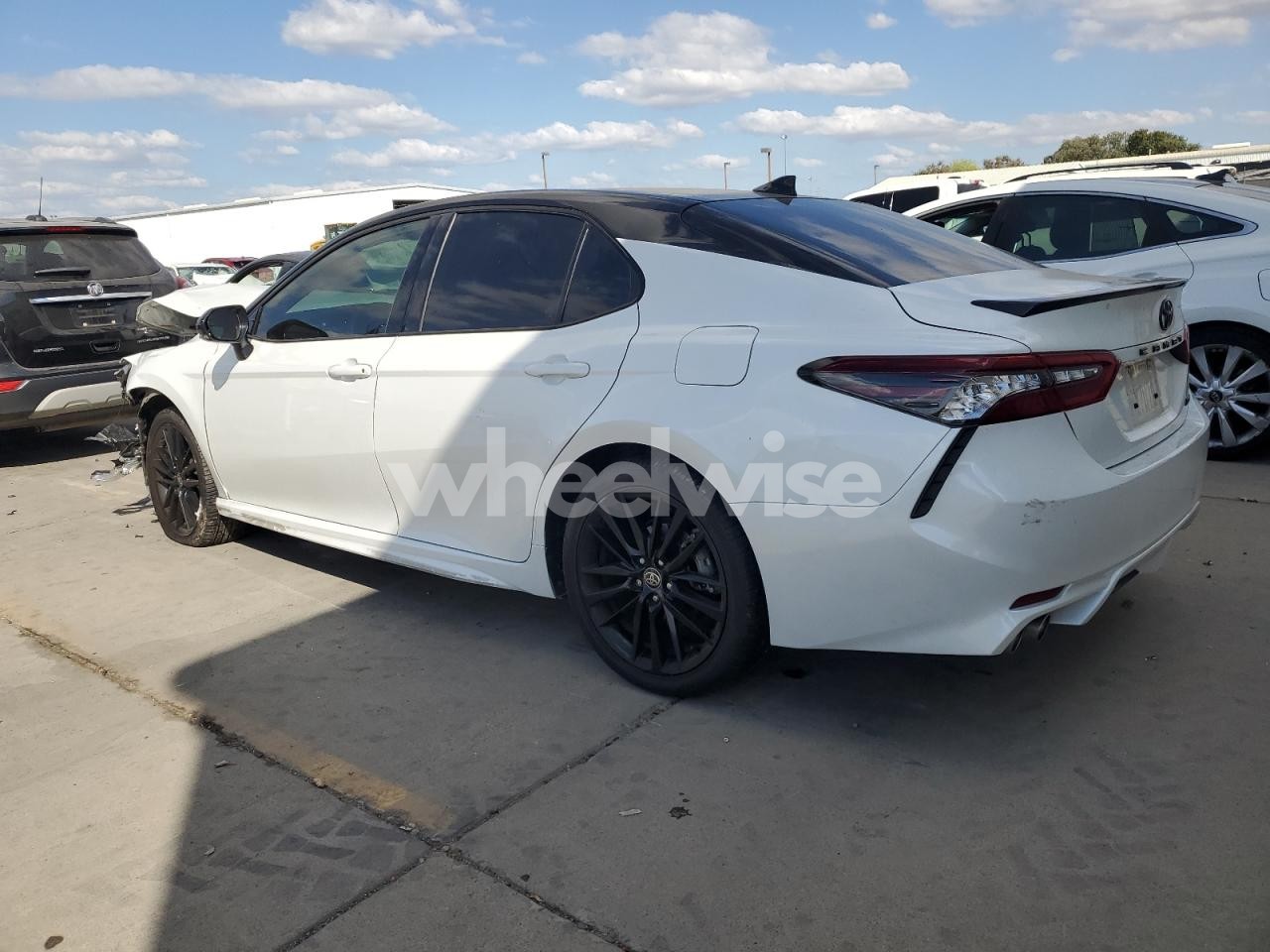Photo 2 of 2021 TOYOTA CAMRY XSE (VIN 4T1K61AK7MU485888)