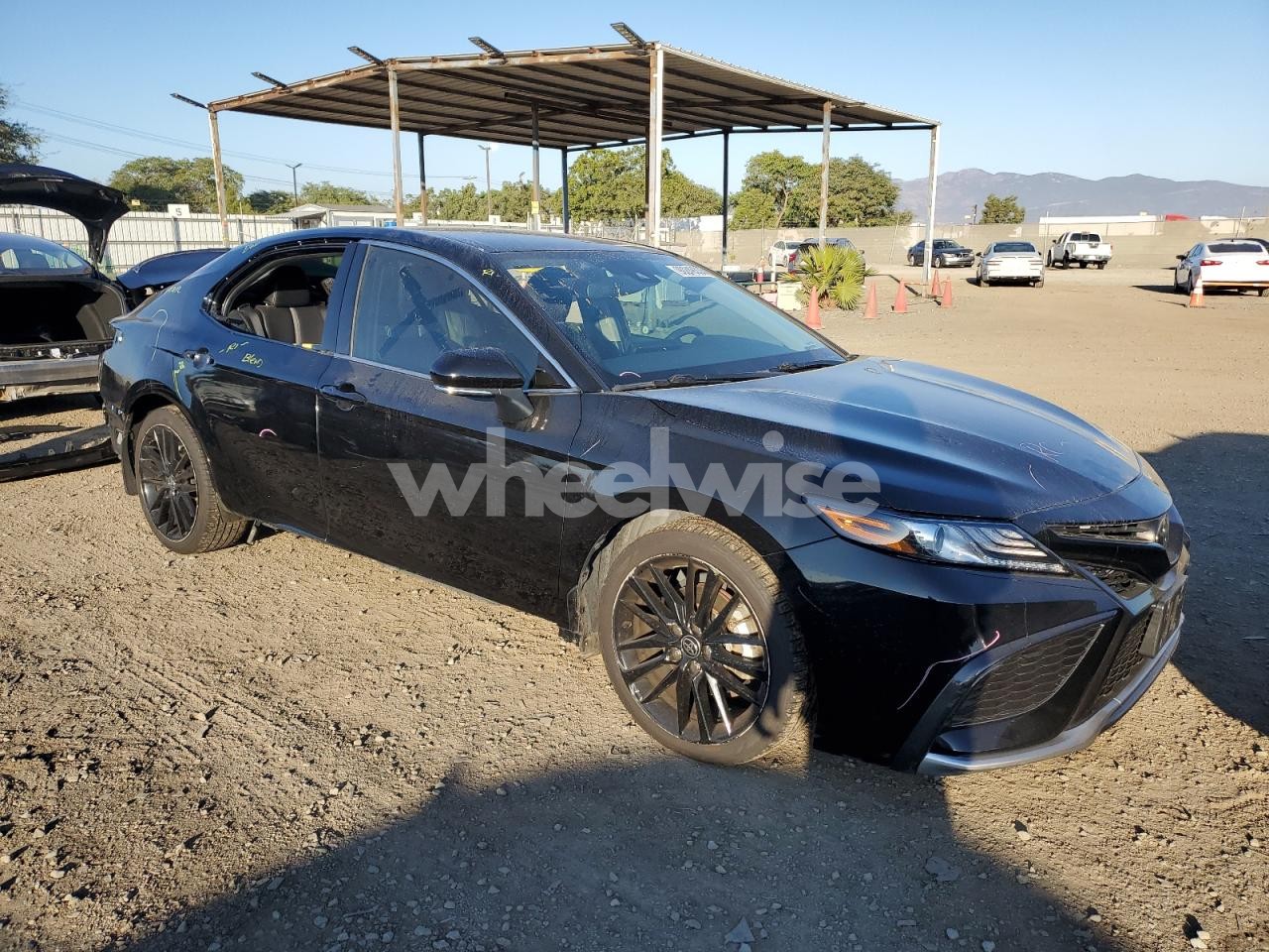 Photo 4 of 2021 TOYOTA CAMRY XSE (VIN 4T1K61AK9MU524416)
