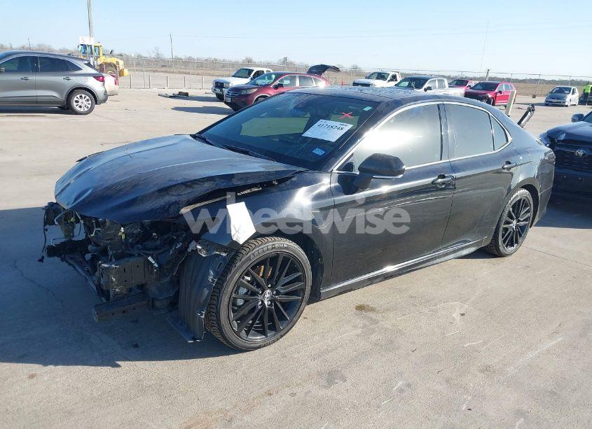 Photo 2 of 2021 Toyota Camry XSE (VIN 4T1K61AKXMU606980)