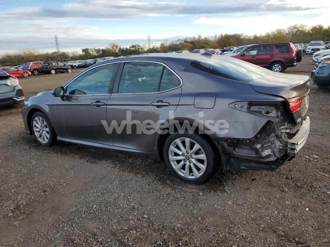 Photo 2 of 2020 TOYOTA CAMRY LE (VIN 4T1L11AK2LU948215)