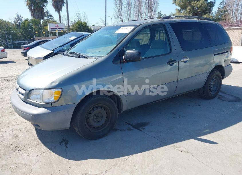 Photo 2 of 1999 Toyota Sienna LE (VIN 4T3ZF13C1XU097653)