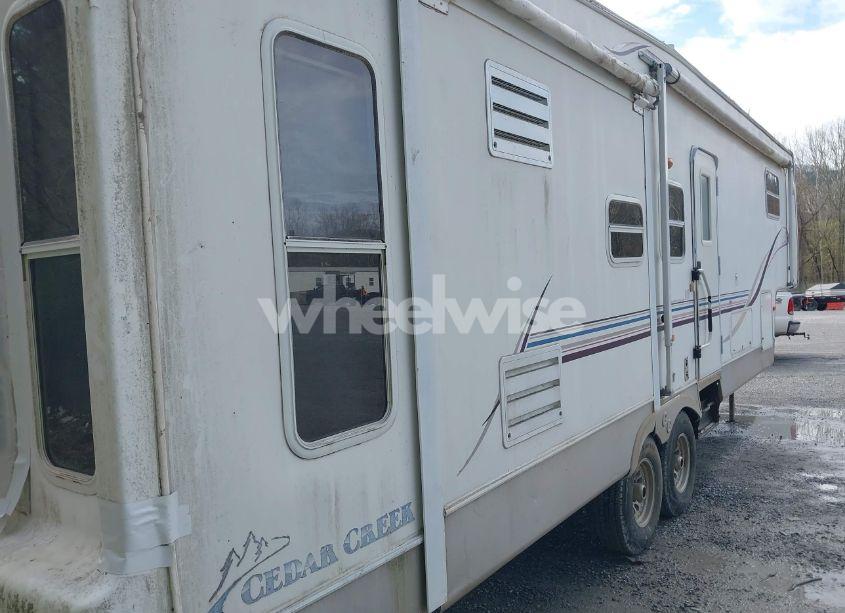 Photo 4 of 2001 Forest River CEDAR CREEK (VIN 4X4FCRK261P183010)