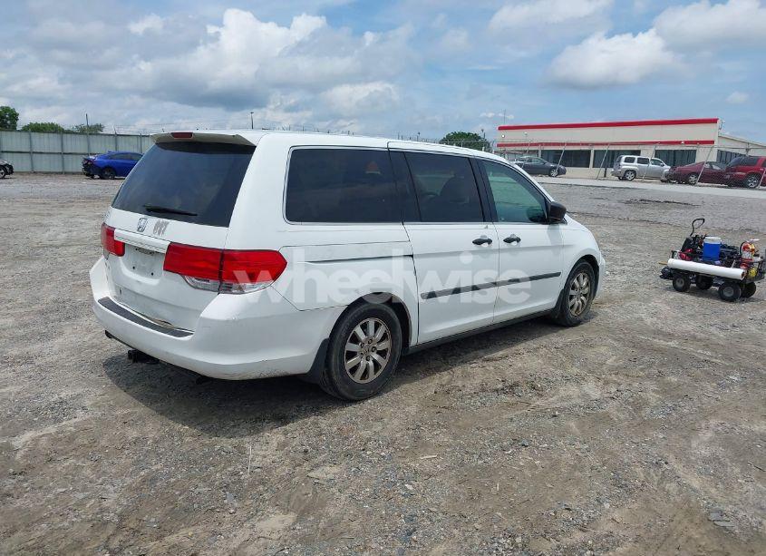 Photo 4 of 2010 Honda Odyssey LX (VIN 5FNRL3H23AB090530)