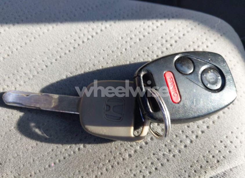 Photo 11 of 2010 Honda Odyssey LX (VIN 5FNRL3H28AB017461)