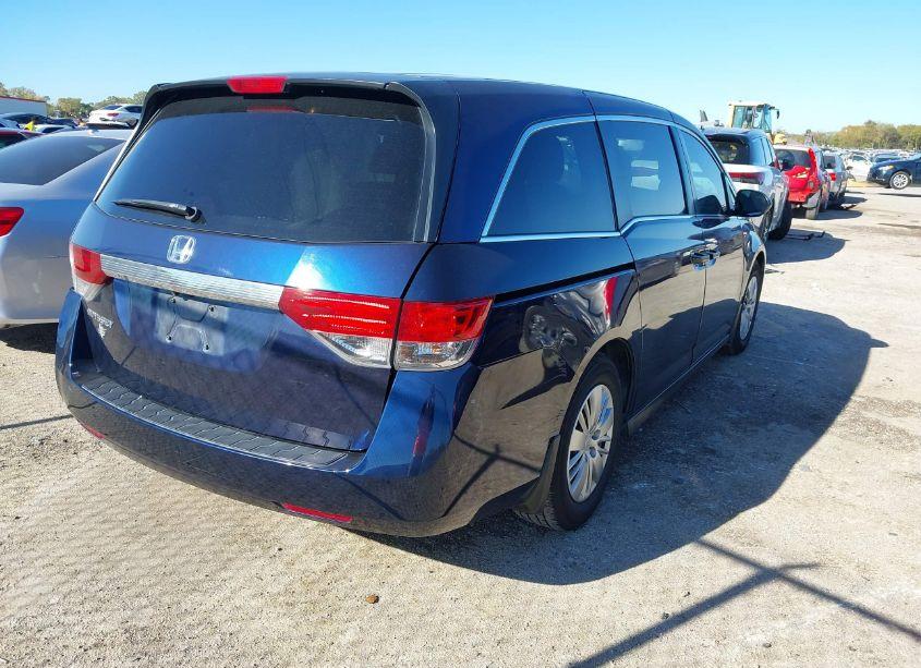 Photo 4 of 2014 Honda Odyssey LX (VIN 5FNRL5H21EB121985)