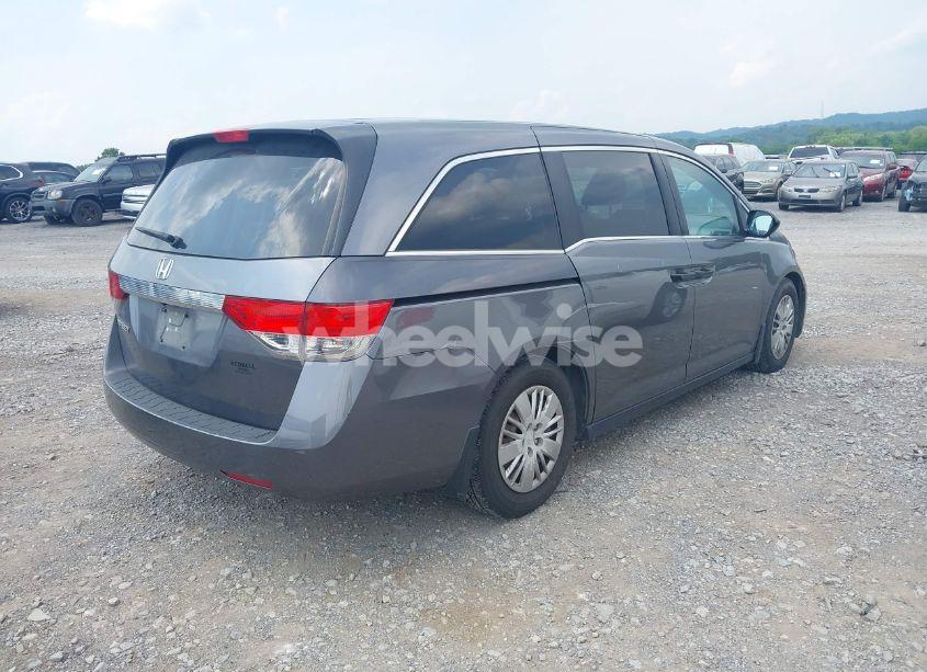 Photo 4 of 2014 Honda Odyssey LX (VIN 5FNRL5H27EB007683)