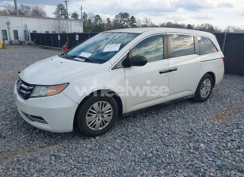 Photo 2 of 2014 Honda Odyssey LX (VIN 5FNRL5H27EB114460)