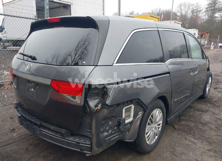 Photo 4 of 2014 Honda Odyssey LX (VIN 5FNRL5H2XEB009962)