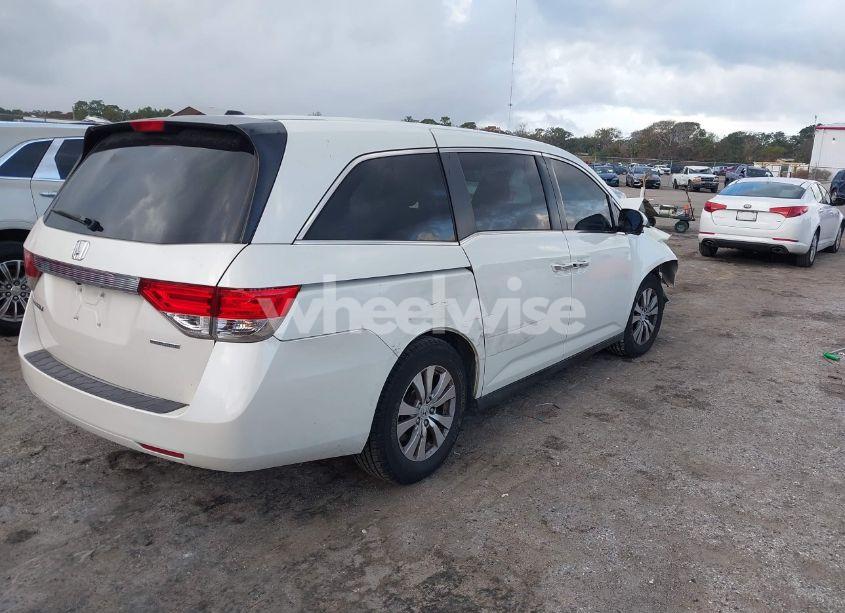 Photo 4 of 2016 Honda Odyssey SE (VIN 5FNRL5H30GB115929)