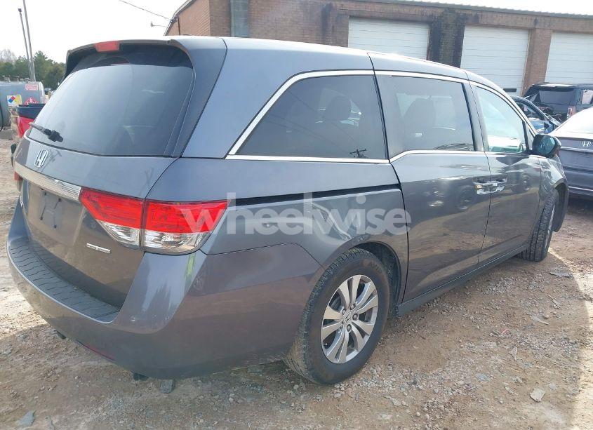 Photo 4 of 2016 Honda Odyssey SE (VIN 5FNRL5H31GB049858)