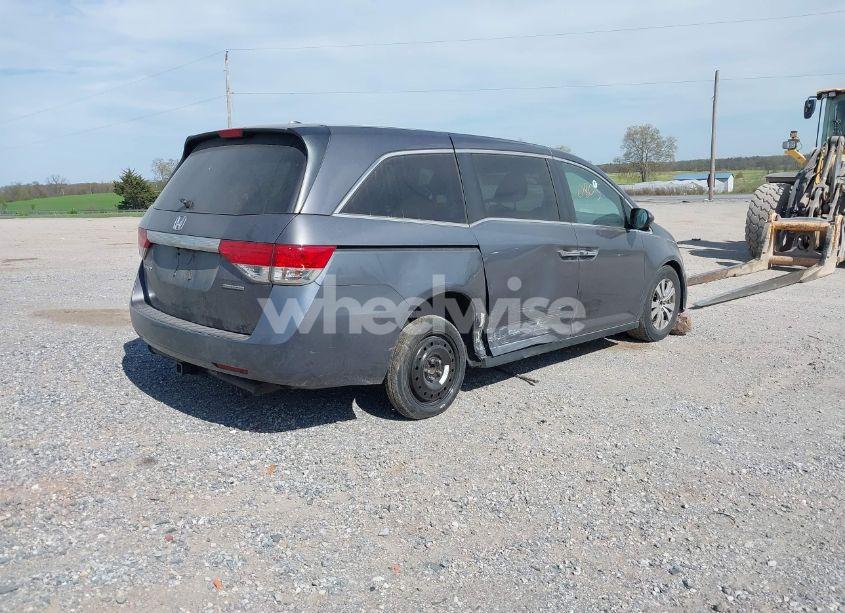 Photo 4 of 2016 Honda Odyssey SE (VIN 5FNRL5H3XGB043251)