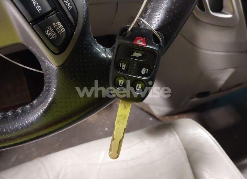 Photo 11 of 2012 Honda Odyssey EX-L (VIN 5FNRL5H60CB010392)