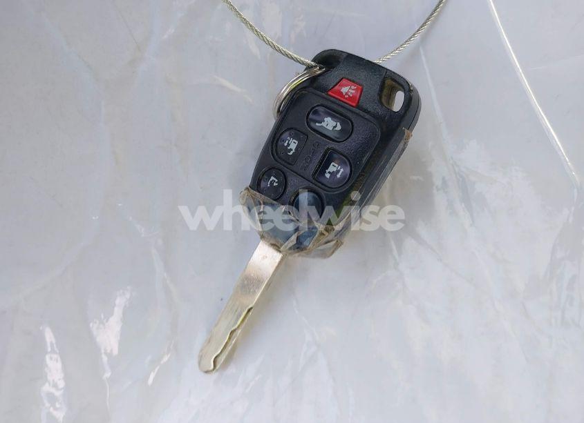 Photo 11 of 2012 Honda Odyssey EX-L (VIN 5FNRL5H66CB001731)