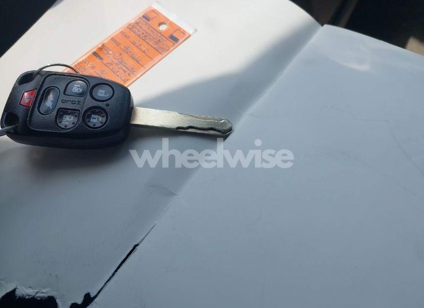 Photo 11 of 2012 Honda Odyssey EX-L (VIN 5FNRL5H66CB100744)