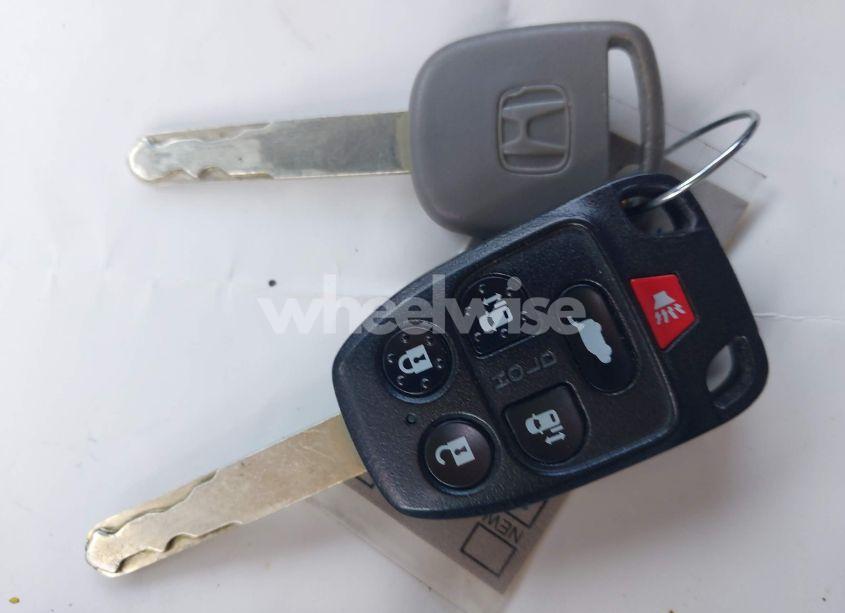 Photo 11 of 2011 Honda Odyssey EX-L (VIN 5FNRL5H68BB047527)