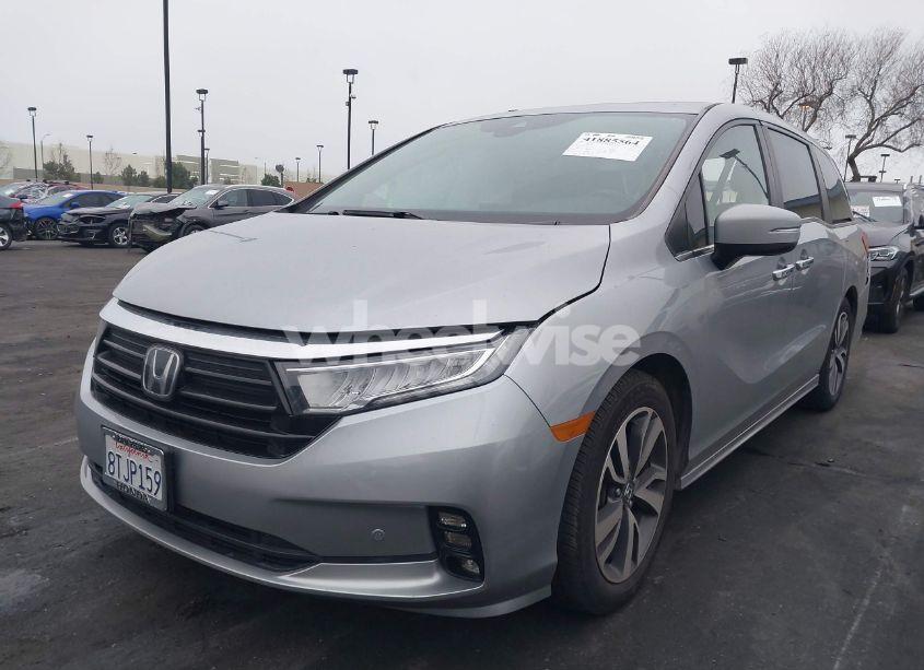 Photo 2 of 2021 Honda Odyssey TOURING (VIN 5FNRL6H88MB000217)