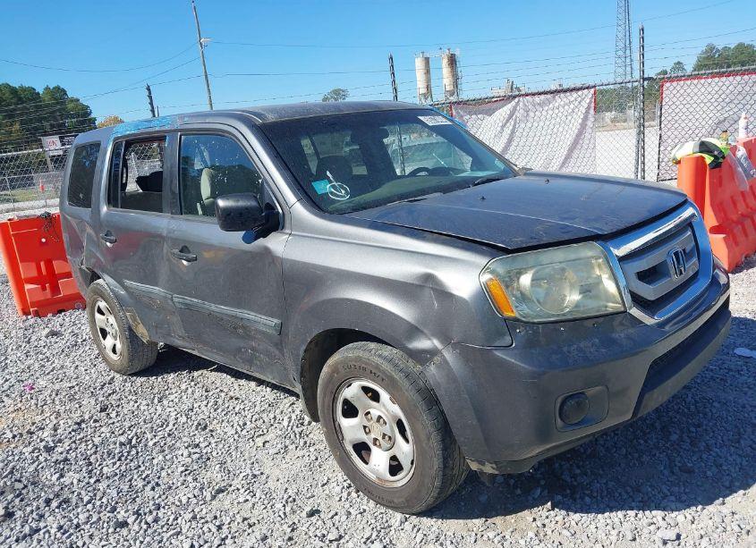 2011 Honda Pilot LX (VIN 5FNYF3H22BB015399) main photo