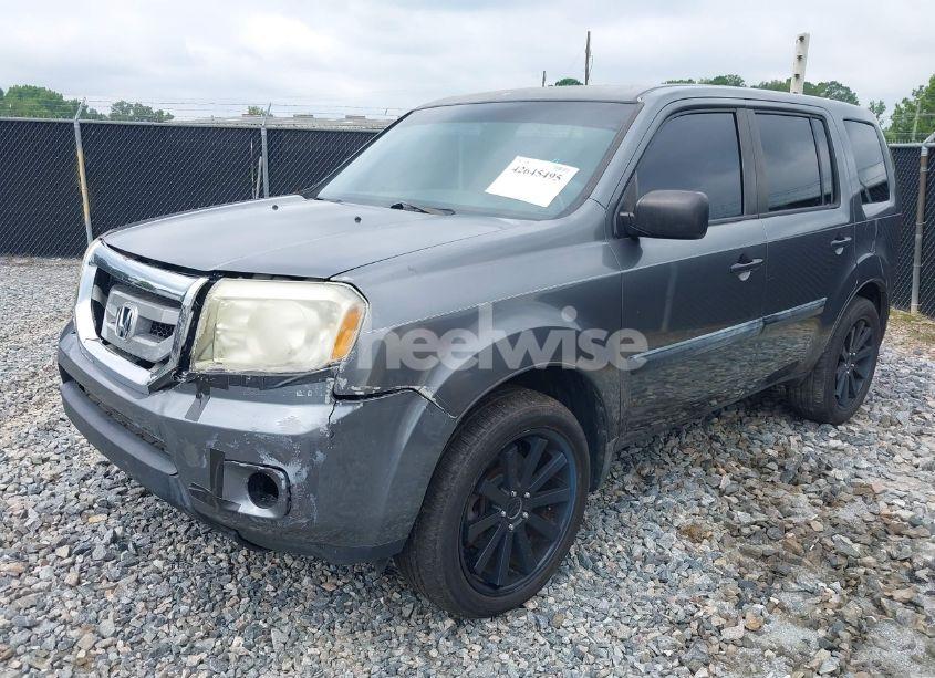 Photo 2 of 2011 Honda Pilot LX (VIN 5FNYF3H22BB046510)