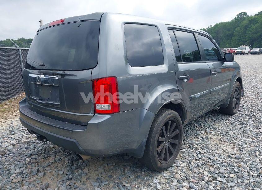 Photo 4 of 2011 Honda Pilot LX (VIN 5FNYF3H22BB046510)