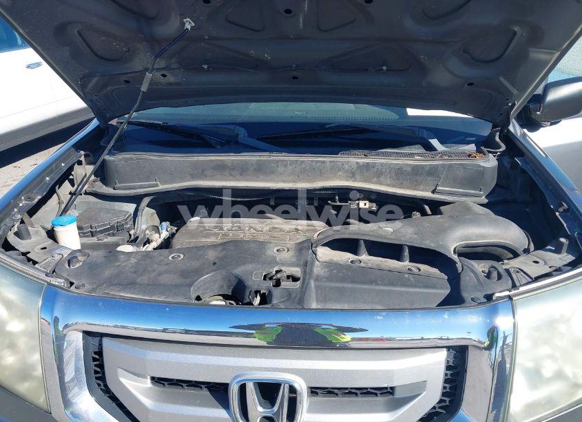 Photo 10 of 2011 Honda Pilot LX (VIN 5FNYF3H24BB022435)