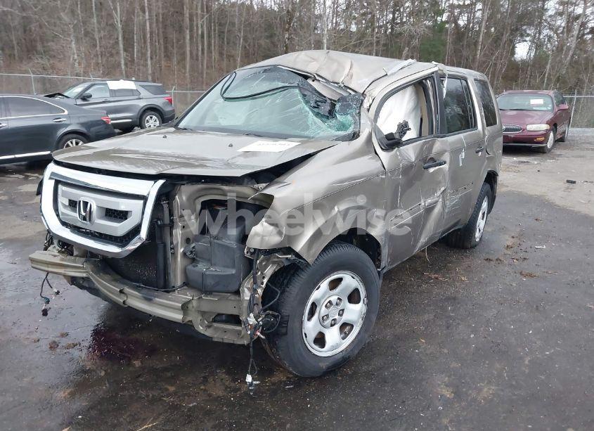 Photo 2 of 2010 Honda Pilot LX (VIN 5FNYF3H25AB010180)