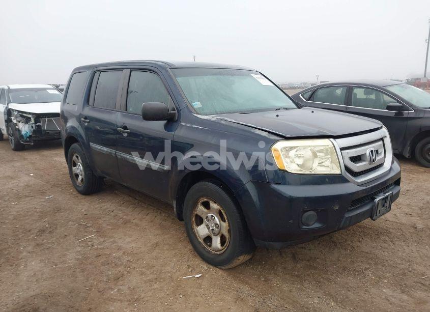 2011 Honda Pilot LX (VIN 5FNYF3H25BB030060) main photo
