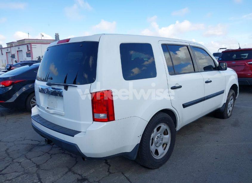 Photo 4 of 2011 Honda Pilot LX (VIN 5FNYF3H27BB052304)