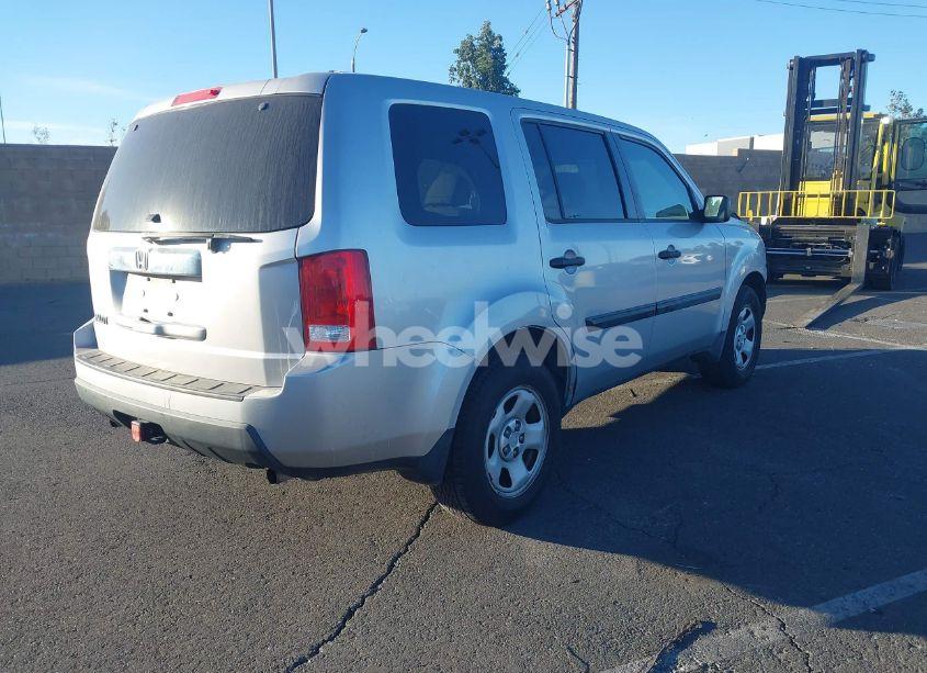 Photo 4 of 2011 Honda Pilot LX (VIN 5FNYF3H28BB025144)