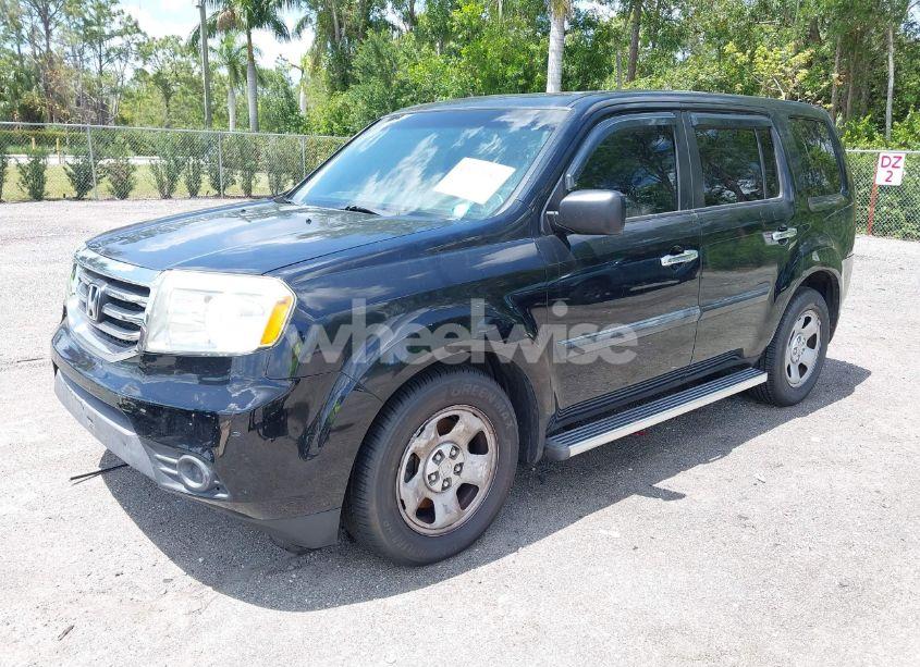 Photo 2 of 2012 Honda Pilot LX (VIN 5FNYF3H2XCB033117)