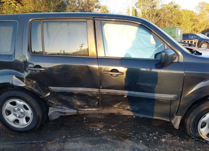 Photo 6 of 2014 Honda Pilot LX (VIN 5FNYF3H2XEB013288)