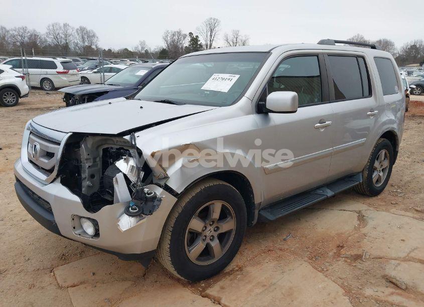 Photo 2 of 2011 Honda Pilot EX (VIN 5FNYF3H40BB017721)