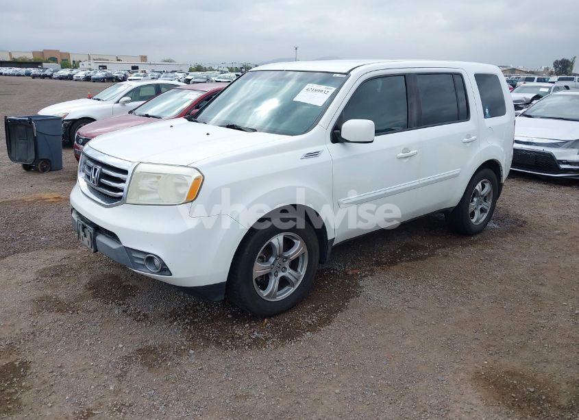 Photo 2 of 2012 Honda Pilot EX (VIN 5FNYF3H40CB034181)