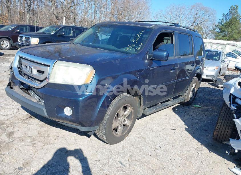 Photo 2 of 2011 Honda Pilot EX (VIN 5FNYF3H43BB030897)
