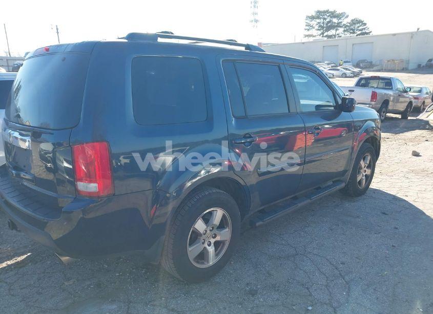 Photo 4 of 2011 Honda Pilot EX (VIN 5FNYF3H43BB030897)