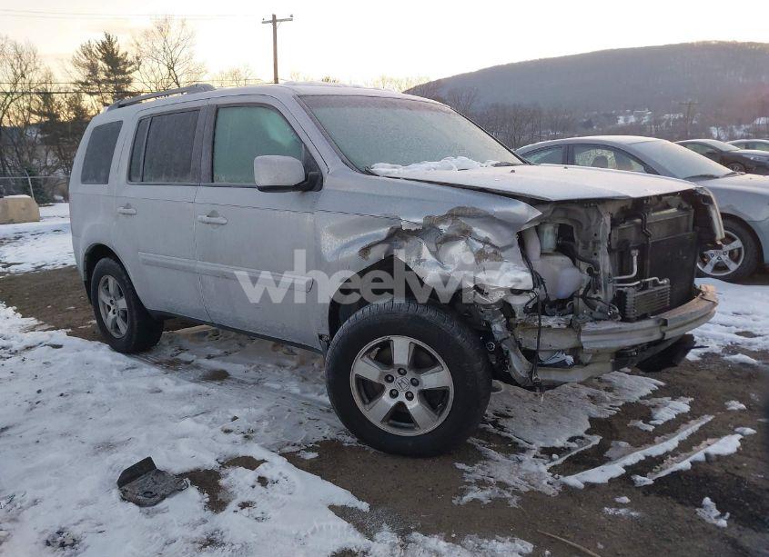 2011 Honda Pilot EX (VIN 5FNYF3H44BB047689) main photo