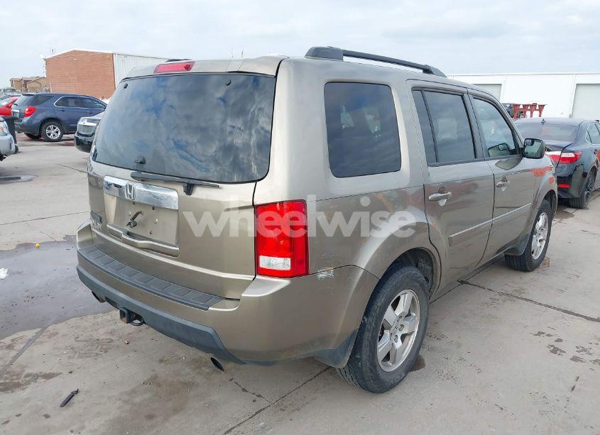 Photo 4 of 2011 Honda Pilot EX (VIN 5FNYF3H4XBB042206)