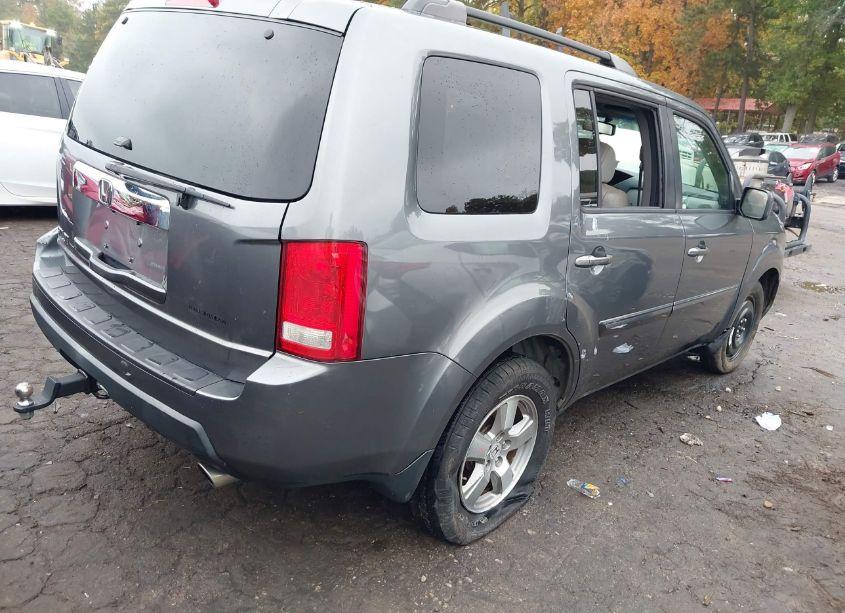 Photo 4 of 2010 Honda Pilot EX-L (VIN 5FNYF3H50AB022103)