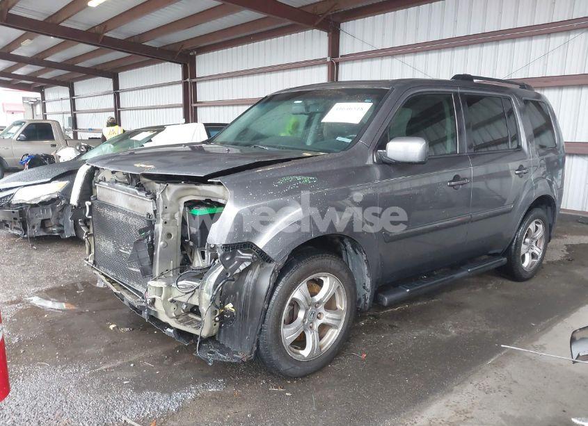 Photo 2 of 2013 Honda Pilot EX-L (VIN 5FNYF3H50DB002907)