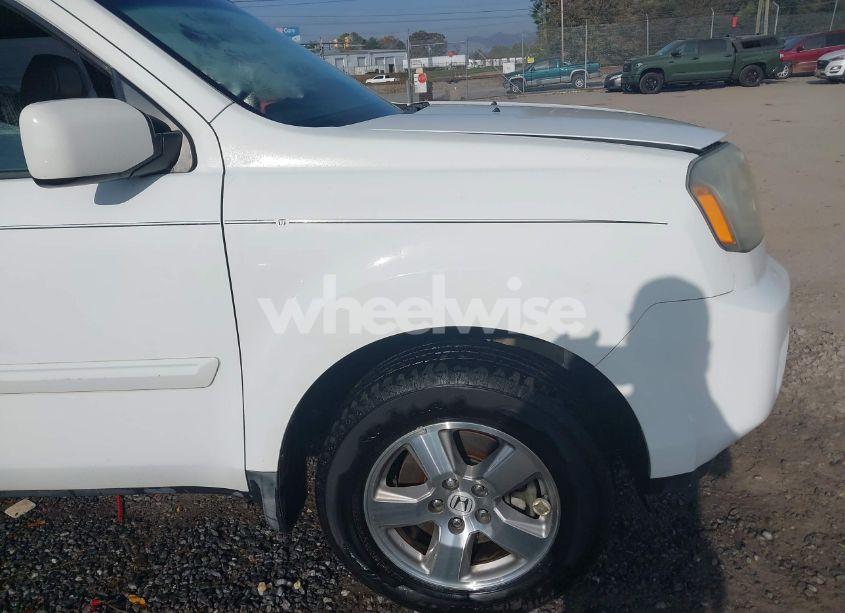 Photo 12 of 2011 Honda Pilot EX-L (VIN 5FNYF3H51BB010107)