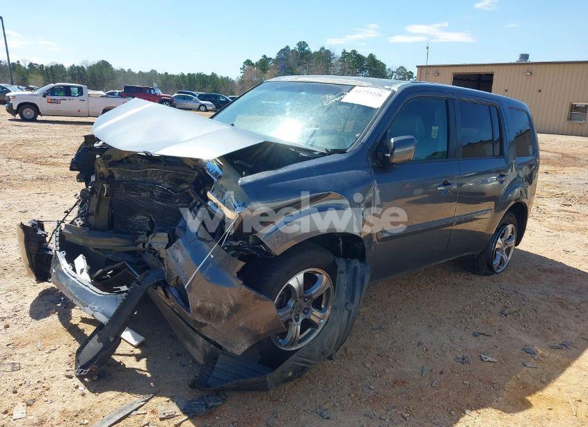 Photo 2 of 2013 Honda Pilot EX-L (VIN 5FNYF3H52DB007770)