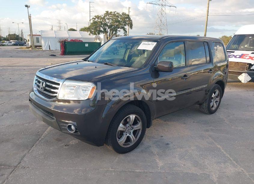 Photo 2 of 2013 Honda Pilot EX-L (VIN 5FNYF3H55DB030671)