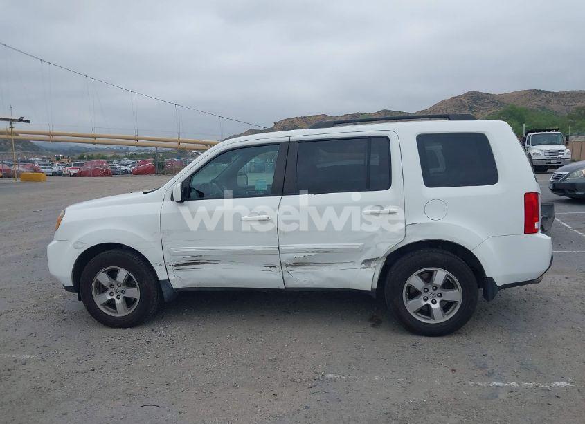 Photo 15 of 2011 Honda Pilot EX-L (VIN 5FNYF3H57BB016834)